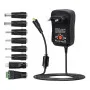 Adaptor de priză reglabil cu opțiune de tensiune inversă și o gamă de la 3V la 12V DC. 8 conectori interschimbabili.
